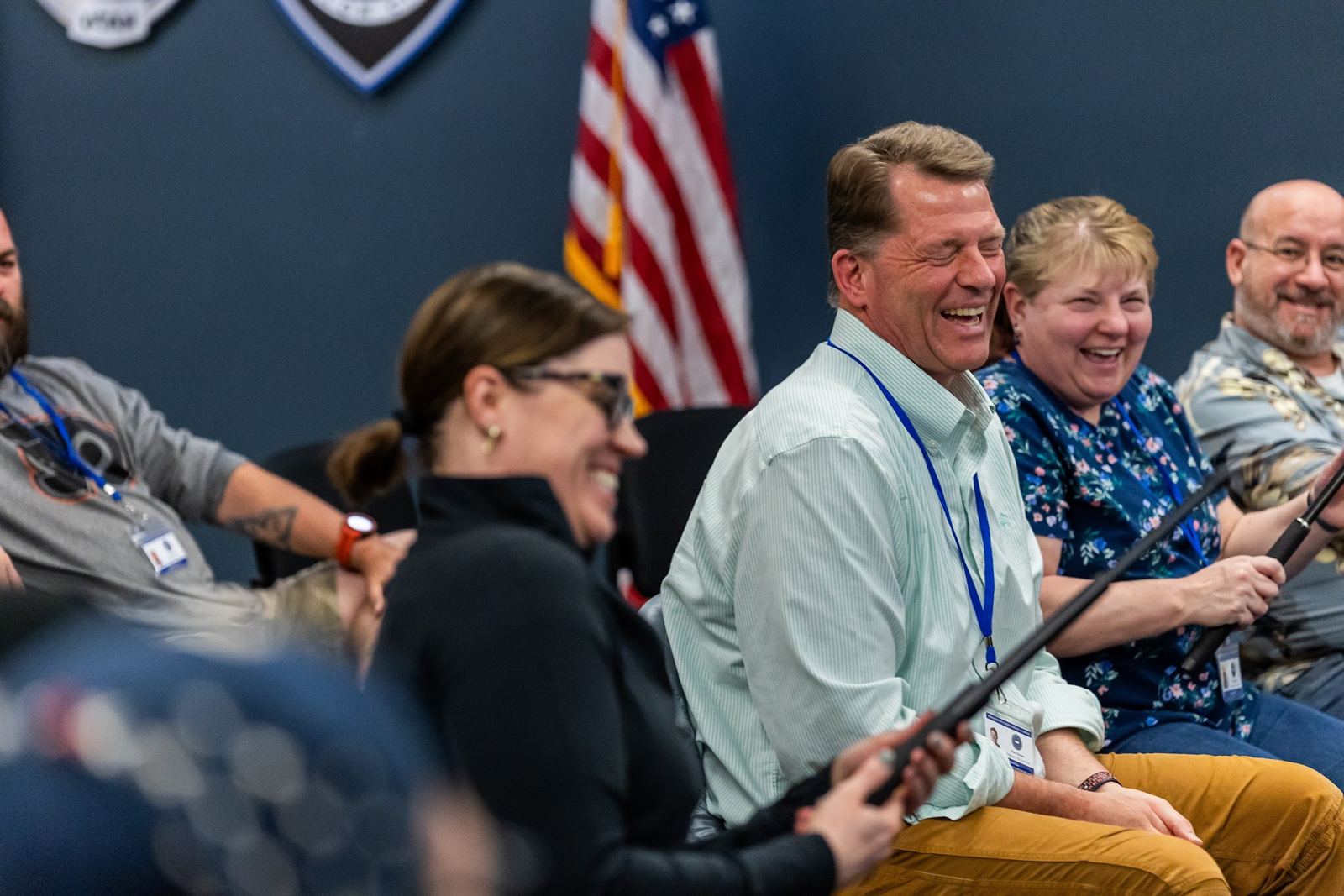 Academy students laughing during a classroom session